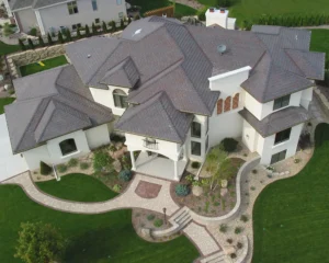 Aerial view of Brava Old World Slate roofing installed by Certified Roofing on a luxury home